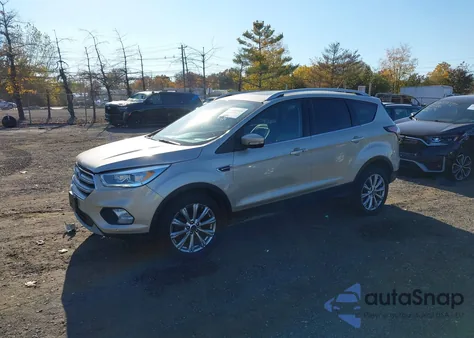 2017 Ford Escape Titanium from USA, damaged, VIN 1FMCU9J94HUB64676